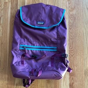 Patagonia backpack. Black Hole, 25L.  Color: purple. Condition: good.